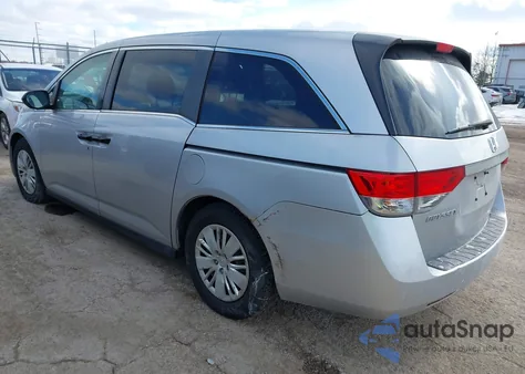 2014 Honda Odyssey Lx z USA, uszkodzony, nr VIN 5FNRL5H23EB016316